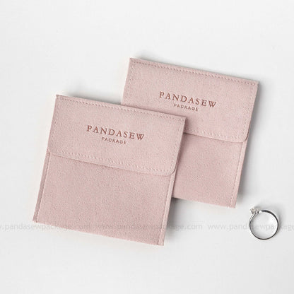 Pink microfiber small bag with a Pandasew debossed logo on top