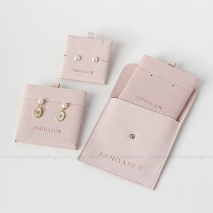 pink jewelry bag and pad